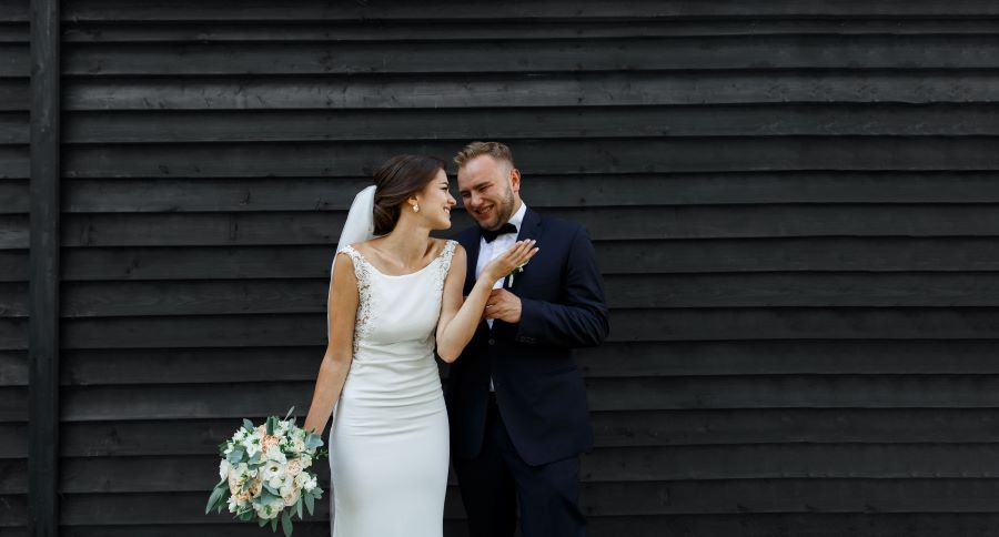 couple-pose-at-luxury-wedding-venue