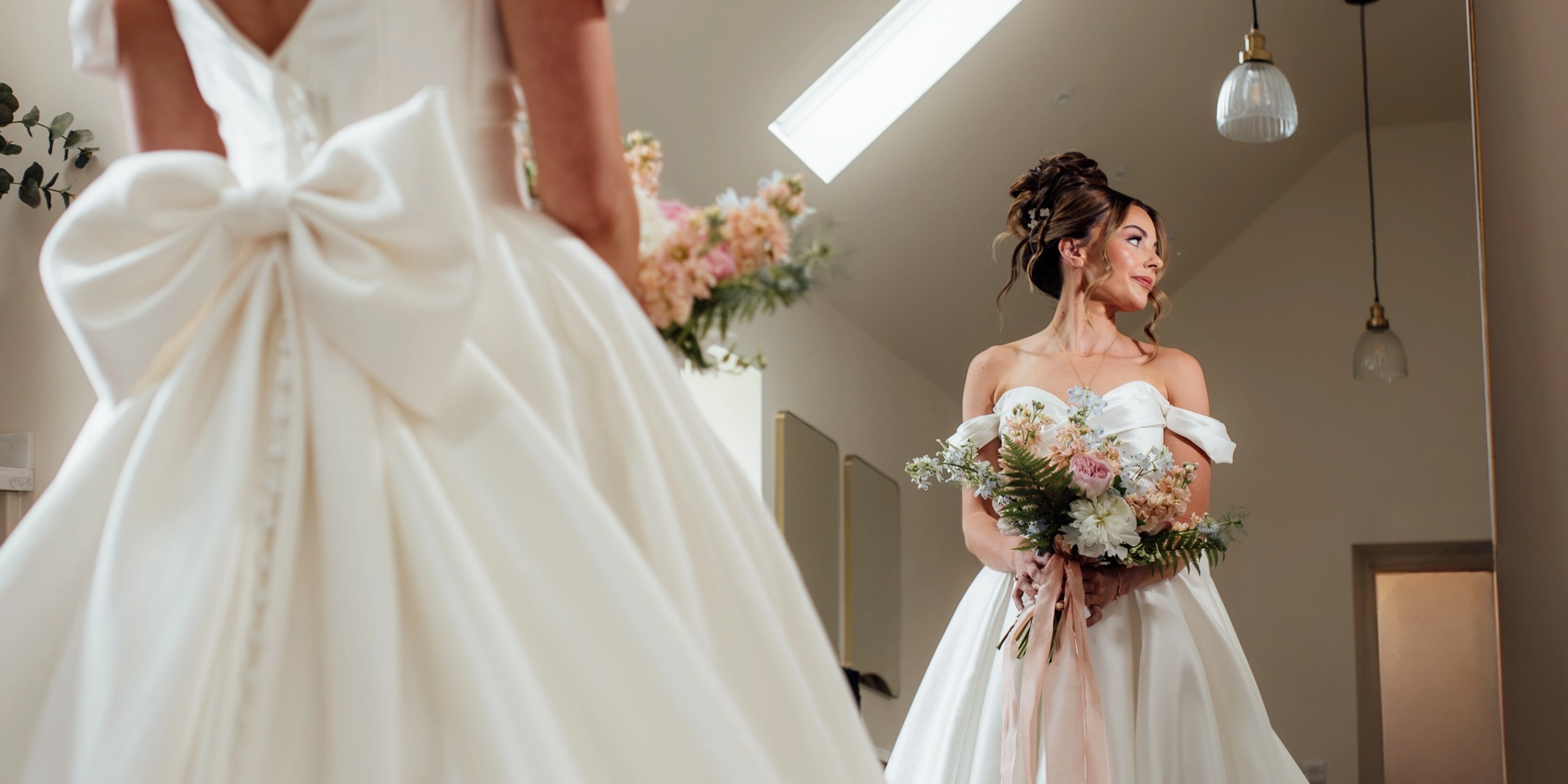 Dressing Room 2 Bride Looking in the mirror in the dressing room
