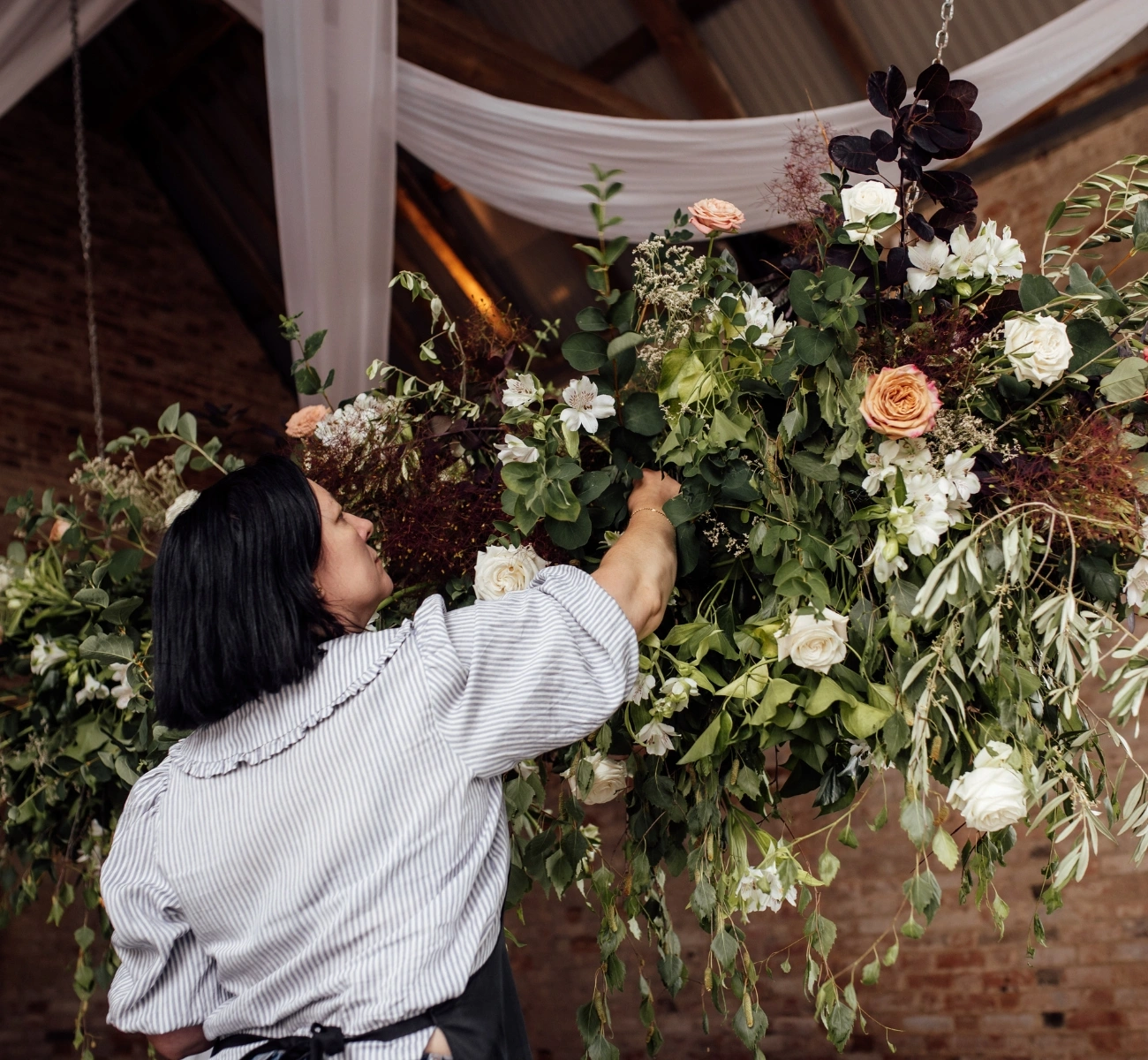 Donna arranging flowers