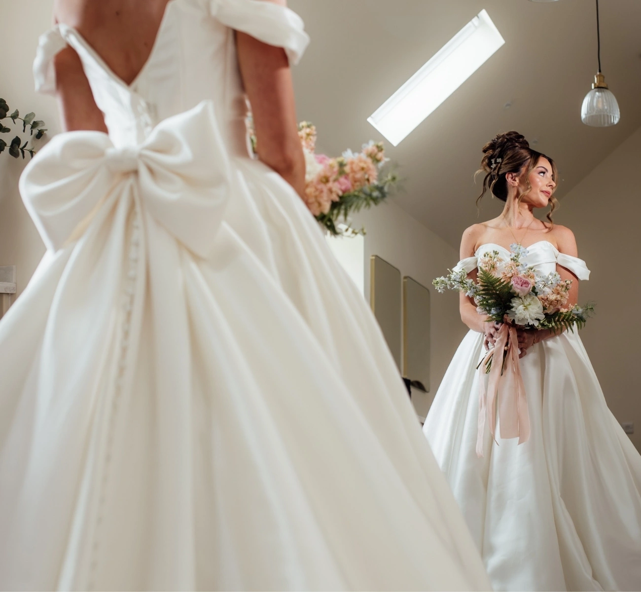 Bride Looking in the mirror in the dressing room