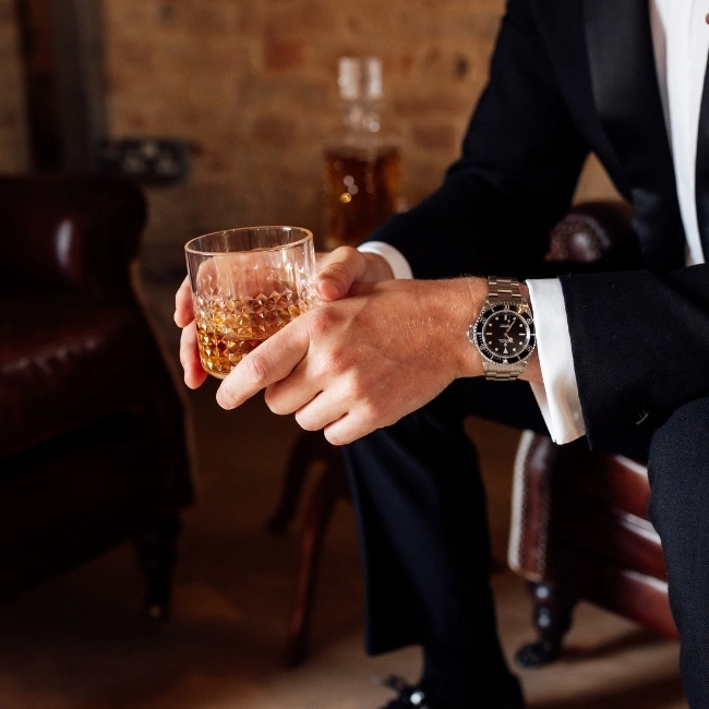 Groom Groom with a glass of Whiskey