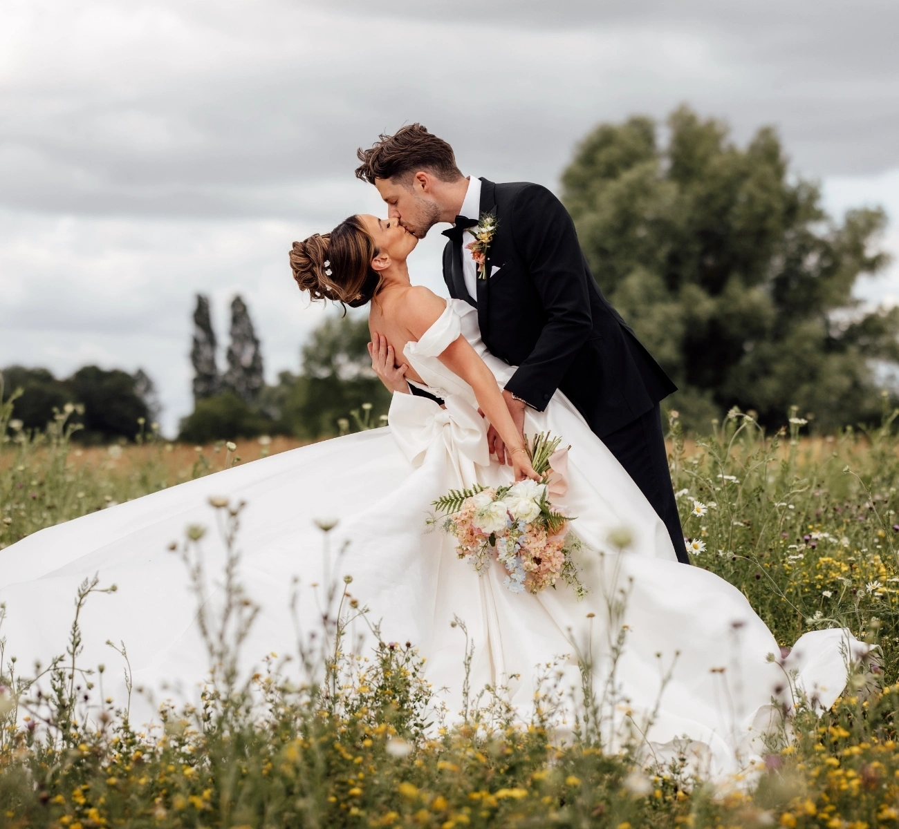 couple in Wildflower meadow