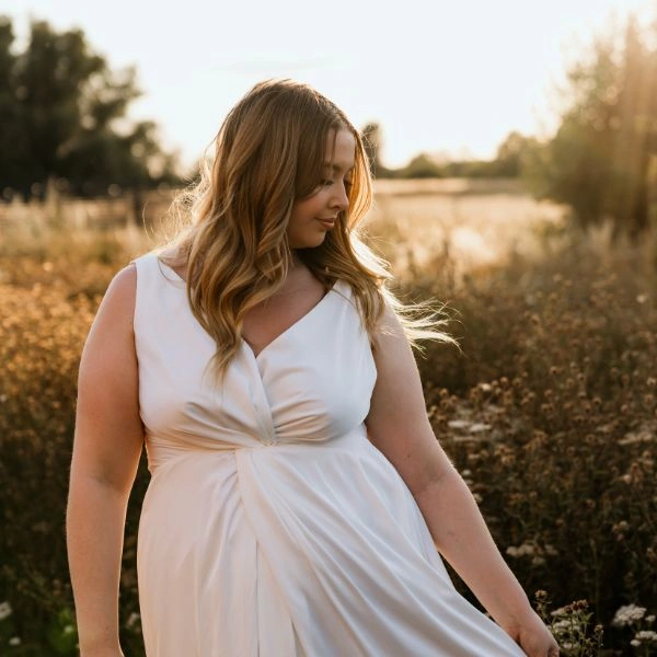 Bride in the fields at Thetford Farm Barn